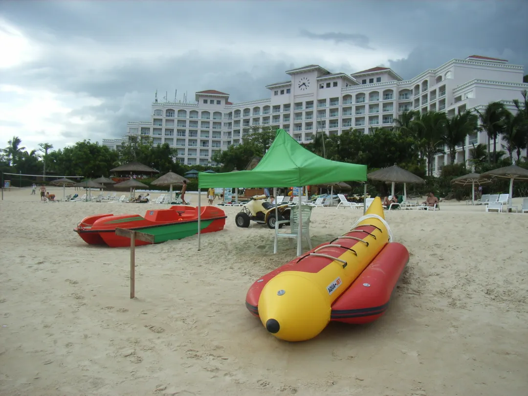 Tropical beach and palm trees in Sanya, Hainan